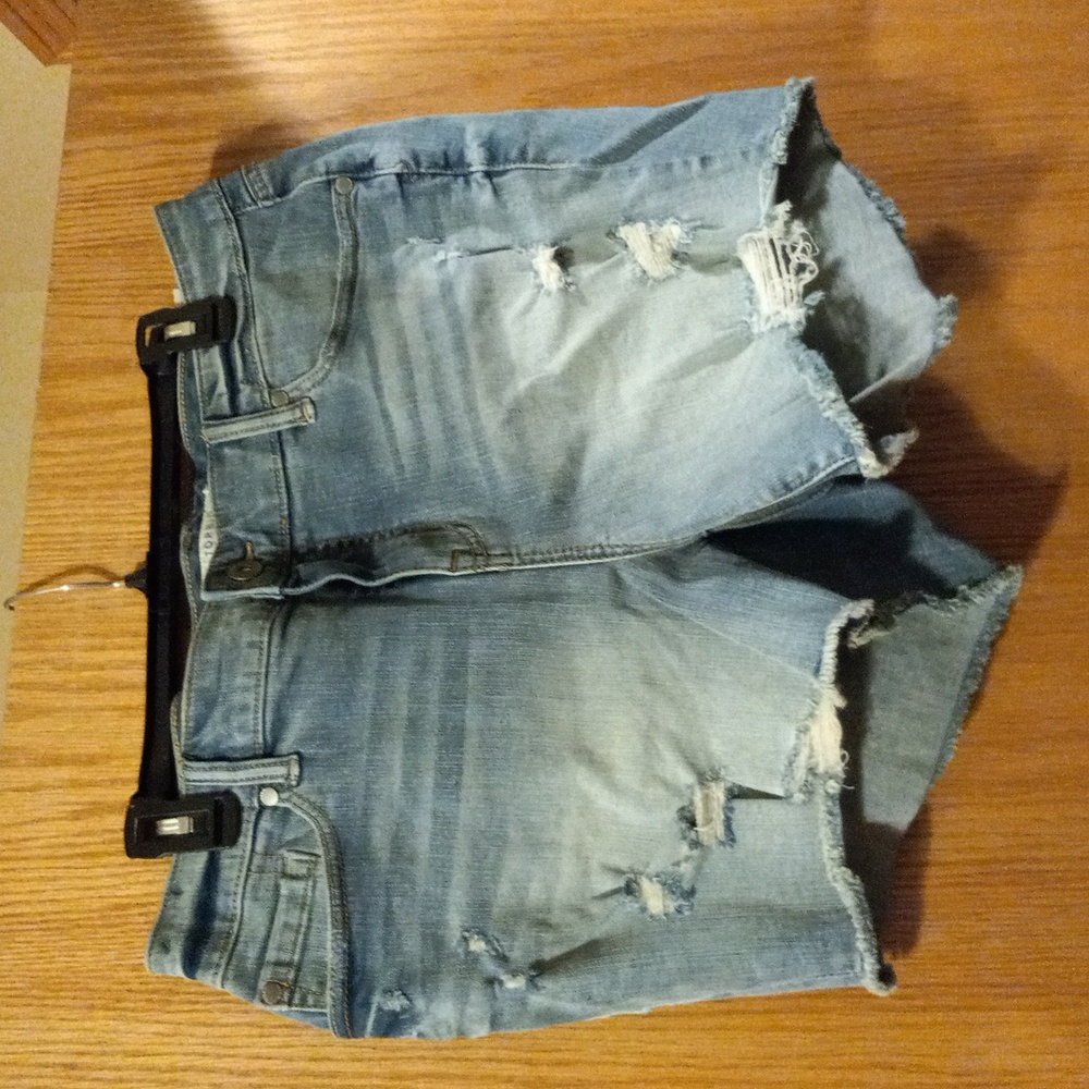 Womens Torrid denim shorts blue jean Cutoff raw hem rainbow back pocket sz 16